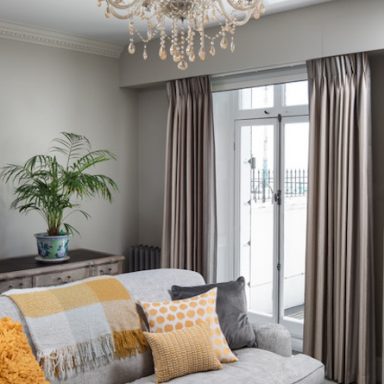 the georgian townhouse living room with grey sofa